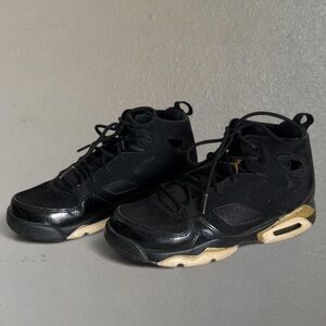 Jordan Black High-Top Sneakers with Gold Jumpman Accent